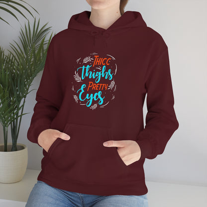 Thicc Thighs Pretty Eyes Unisex Heavy Blend™ Hooded Sweatshirt