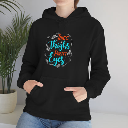 Thicc Thighs Pretty Eyes Unisex Heavy Blend™ Hooded Sweatshirt