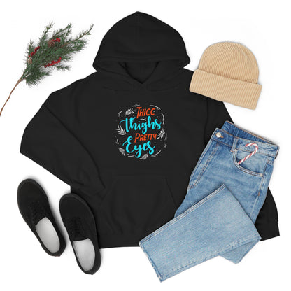 Thicc Thighs Pretty Eyes Unisex Heavy Blend™ Hooded Sweatshirt