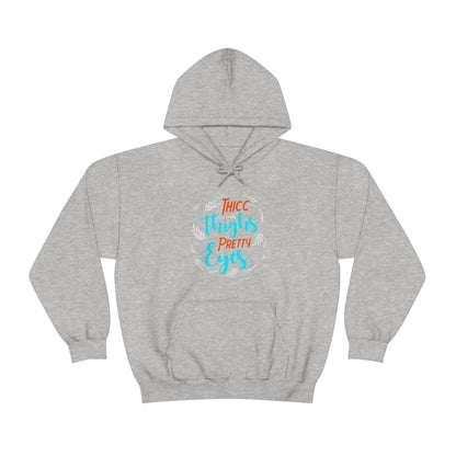 Thicc Thighs Pretty Eyes Unisex Heavy Blend™ Hooded Sweatshirt