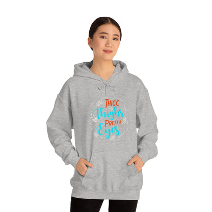 Thicc Thighs Pretty Eyes Unisex Heavy Blend™ Hooded Sweatshirt