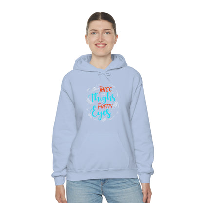 Thicc Thighs Pretty Eyes Unisex Heavy Blend™ Hooded Sweatshirt